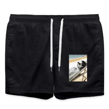Woman lying on a sun lounger on the beach - Swim Trunks - black - Front - AI Model Male 185 light (185cm)