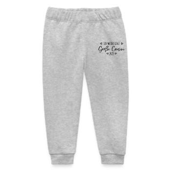 Ich werde eine große Cousine 2025 - Baby Organic Jogginghose Baby Tumbler von Stanley/Stella - Grau meliert - Vorne