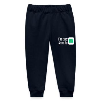 Fastenmodus AUF Textgestaltung - Baby Organic Jogginghose Baby Tumbler von Stanley/Stella - Navy - Vorne