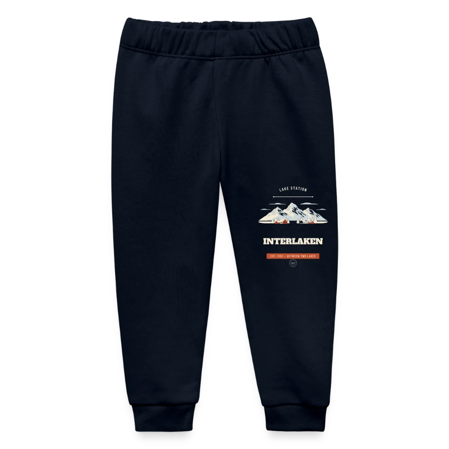 Interlaken badge on a baby organic sweatpants by stanley/stella, navy