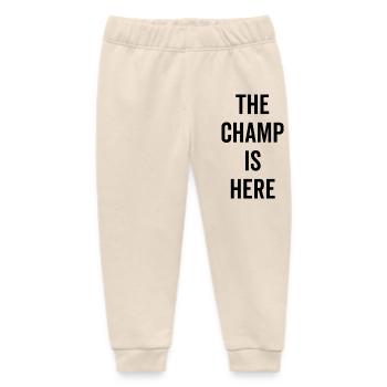 Der Champion ist da - Baby Organic Jogginghose Baby Tumbler von Stanley/Stella - Natur - Vorne
