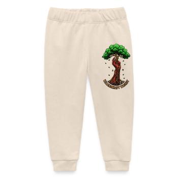 Willenskraft Wachst - Baby Organic Jogginghose Baby Tumbler von Stanley/Stella - Natur - Vorne