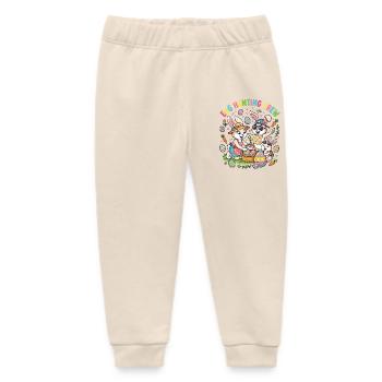 Hosterhasen Familie -Eier Sammler - Baby Organic Jogginghose Baby Tumbler von Stanley/Stella - Natur - Vorne