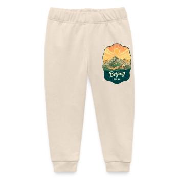 Pekinger Große Mauer Retro-Sonnenuntergangs-Reiseabzeichen - Baby Organic Jogginghose Baby Tumbler von Stanley/Stella - Natur - Vorne