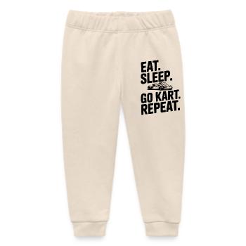 Eat. Sleep. Go Kart. Repeat. - Baby Organic Sweatpants by Stanley/Stella - soft Ecru - Front