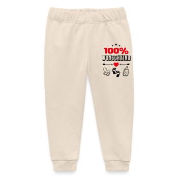 100% Wunschkind Wunschbaby Babysprüche Herz - Baby Organic Jogginghose Baby Tumbler von Stanley/Stella - Natur - Vorne