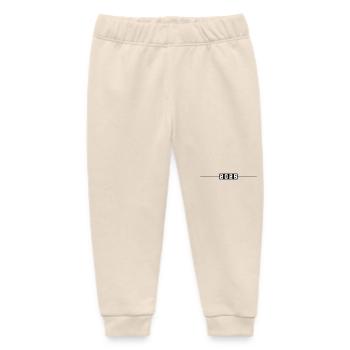 2025 Linie - Baby Organic Jogginghose Baby Tumbler von Stanley/Stella - Natur - Vorne