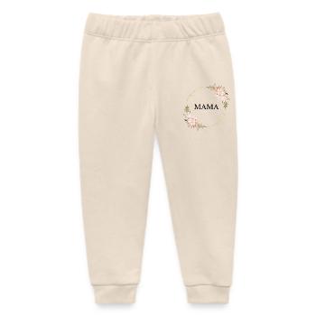 Anneau doré Cadre floral rose - Pantalon de jogging bébé bio Stanley/Stella - écru doux - Devant