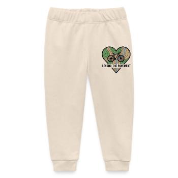 Jenseits des Asphalts Gravel Bike Herz - Baby Organic Jogginghose Baby Tumbler von Stanley/Stella - Natur - Vorne
