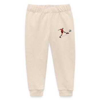 Dynamischer Fußballspieler in Bewegung - Baby Organic Jogginghose Baby Tumbler von Stanley/Stella - Natur - Vorne