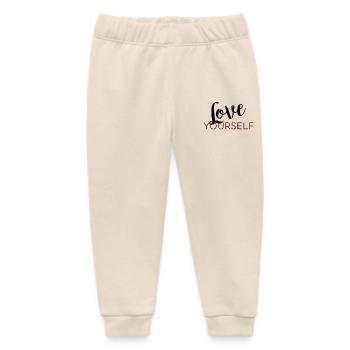 Love Yourself -Schriftzug Pascal Voggenhuber - Baby Organic Jogginghose Baby Tumbler von Stanley/Stella - Natur - Vorne