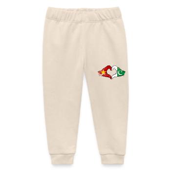 Vietnam Pakistan Flagge Hände Herzform used - Baby Organic Jogginghose Baby Tumbler von Stanley/Stella - Natur - Vorne