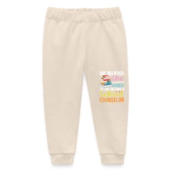 She Became A School Counselor für eine - Baby Organic Jogginghose Baby Tumbler von Stanley/Stella - Natur - Vorne