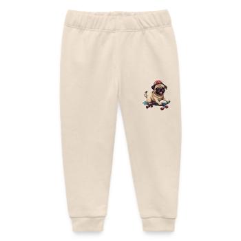 Skateboardender Mops: Dynamisches Hund- und - Baby Organic Jogginghose Baby Tumbler von Stanley/Stella - Natur - Vorne