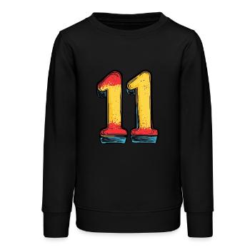 11 Number Comic - Teens Organic Sweatshirt by Stanley/Stella - black - Front - AI Model Teenager Male light (155cm)