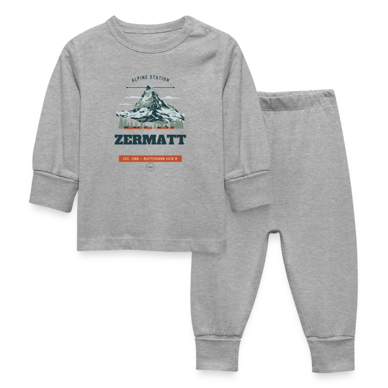 Zermatt badge on a baby sleepsuit