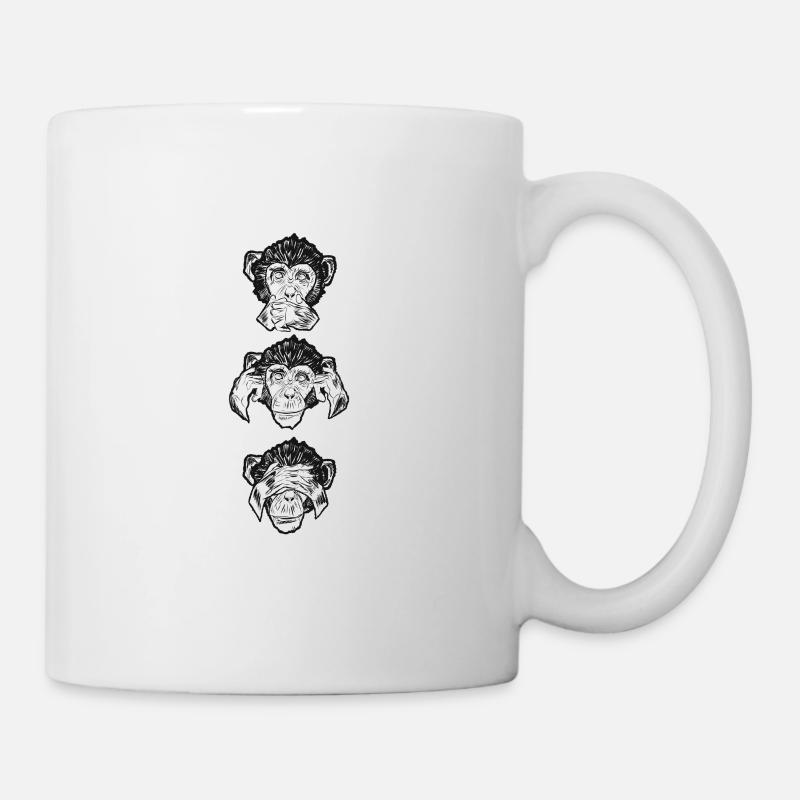 The three monkeys are seen listening to hear - Mug - white