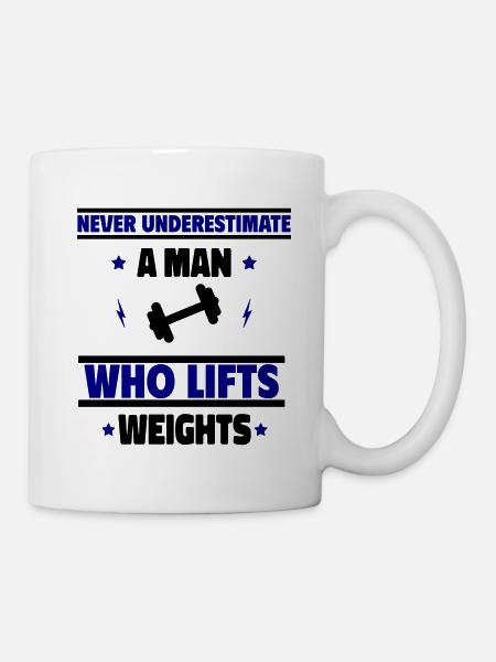 Never underestimate a man who lifts weights - Mug - white