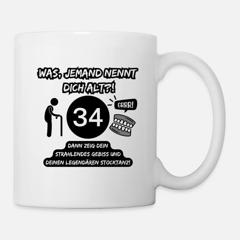 34 ans et légendaire : Les dents sorties, le bâton danse ! - Mug blanc - blanc
