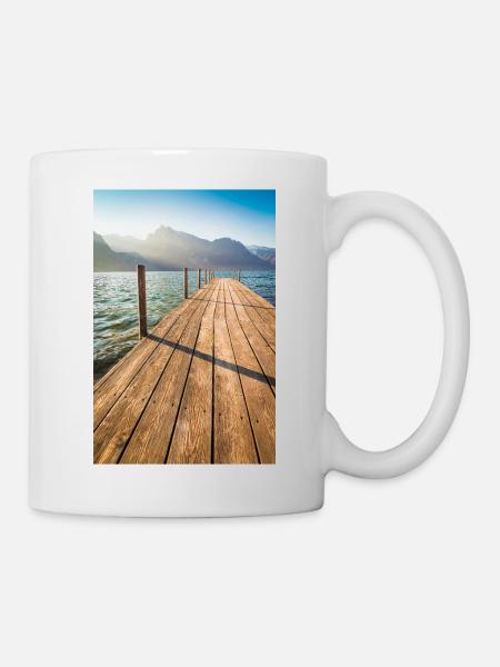 Wooden jetty at the mountain lake in the sunlight - Mug - white