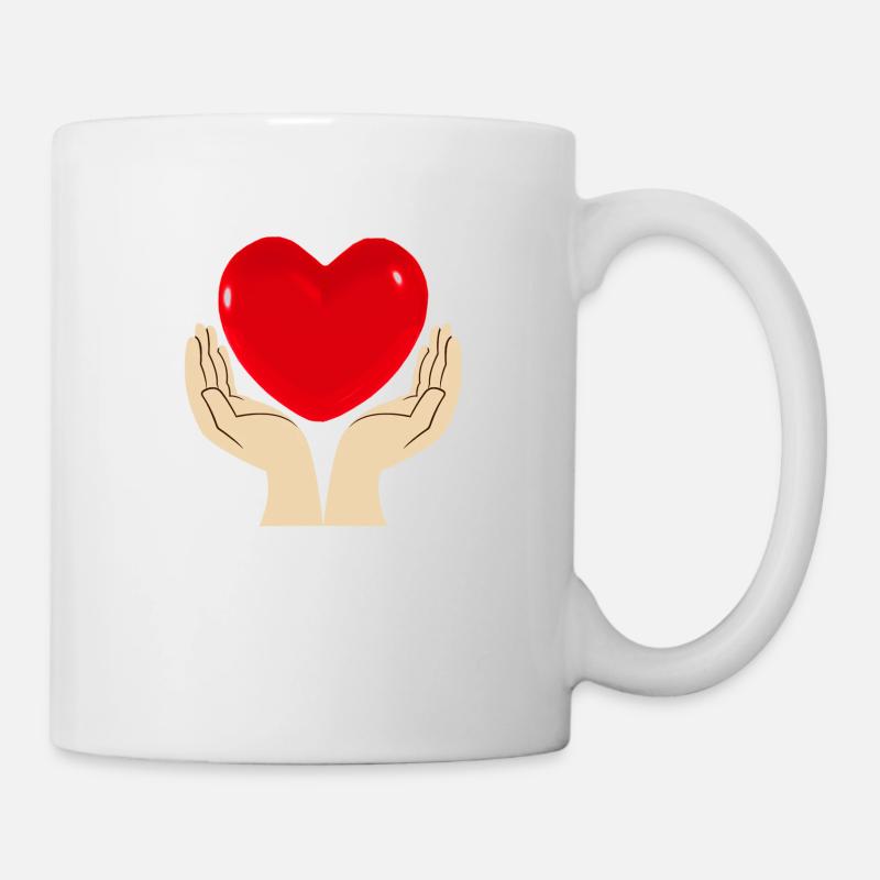 Two hands hold a red heart in the middle - Mug - white