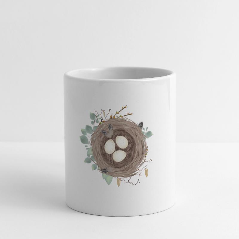 Vogelnest oder Osternest mit drei Eier und Federn Tasse