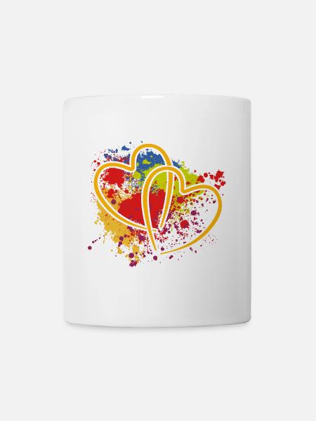 zwei verschlungene Herzen auf Farbklecksen - Tasse - Weiß