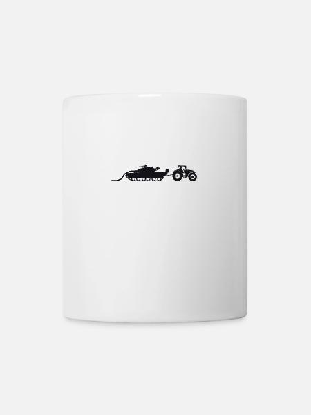 A tractor pulling a broken tank. - Mug - white