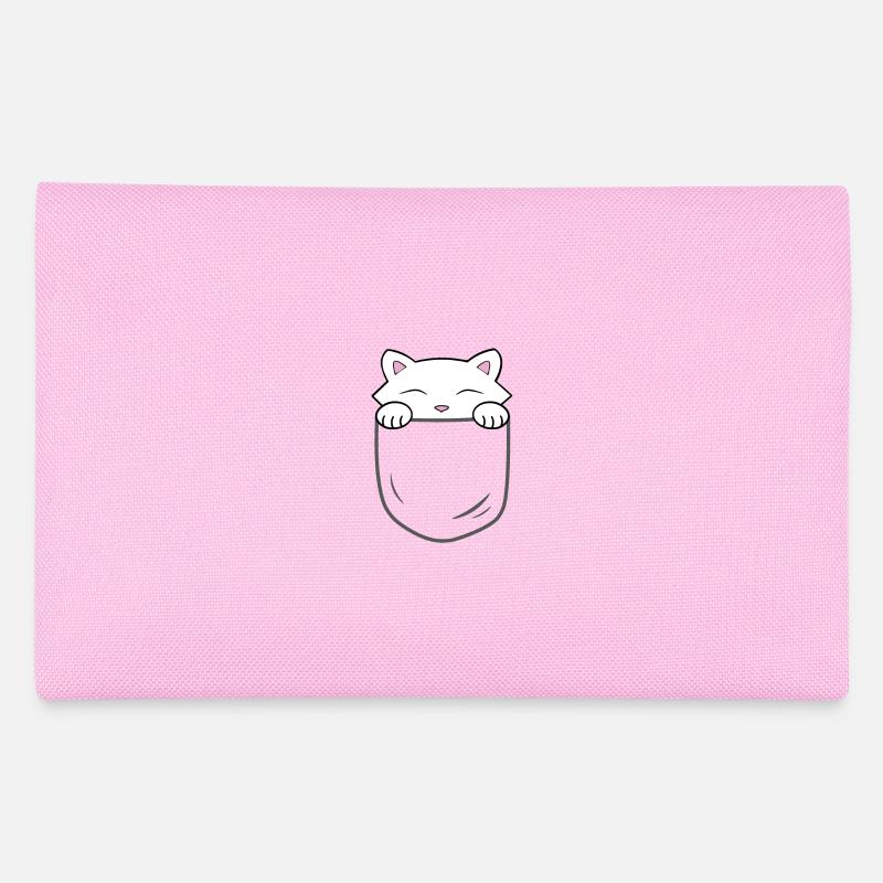Chat mignon assis dans une poche Trousse