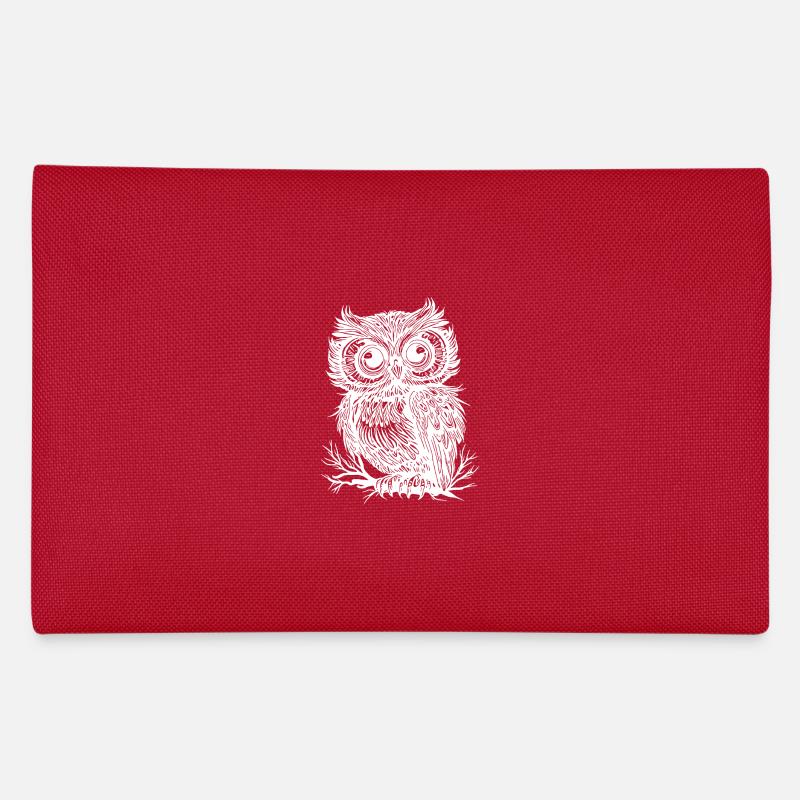 Chouette des forêts à grands yeux sur une branche Trousse