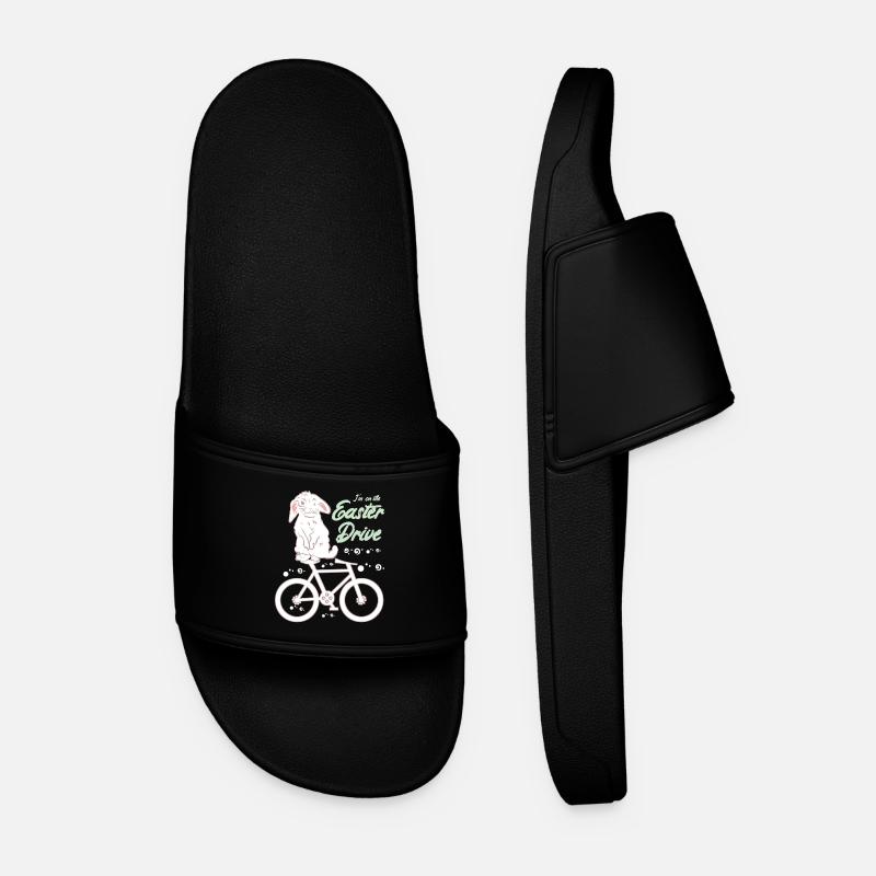 Easter bunny with bicycle - Men’s Pool Sliders - black