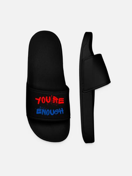 Expressive graffiti designs with splashes of paint - Men’s Pool Sliders - black