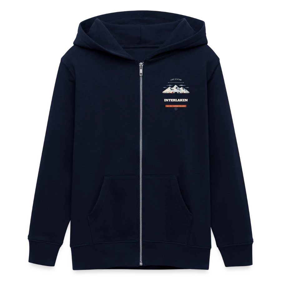 Interlaken badge on a teens organic zip-up hoodie by stanley/stella, navy