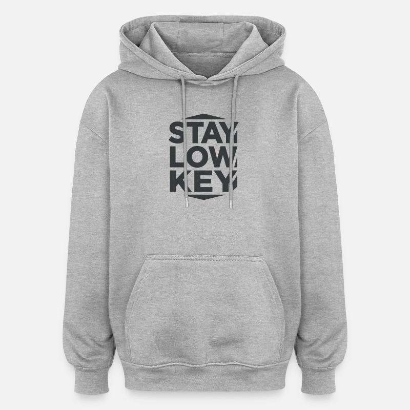 Stay Low Key – ruhige Wohnästhetik - Oversized Unisex Hoodie - Grau meliert