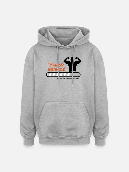 Bientôt musclé  - Sweat à capuche oversize unisexe - gris chiné