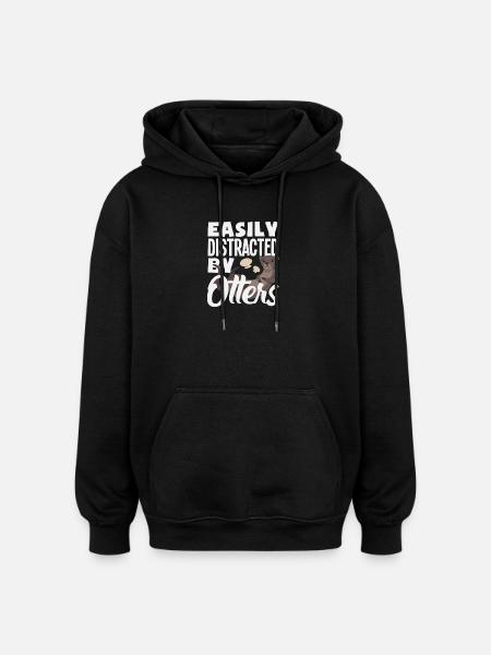 Easily distracted by sea otter cartoon - Oversized Unisex Hoodie - black