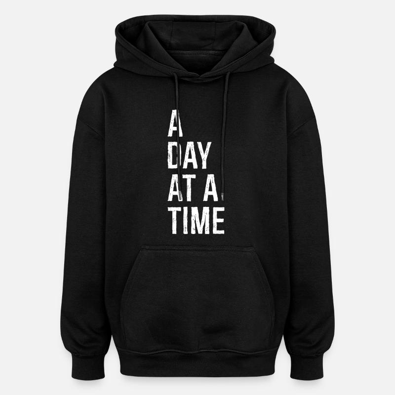 Un jour à la fois - Sweat à capuche oversize unisexe - noir
