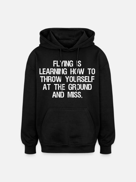 flying is learning how to throw yourself at the - Oversized Unisex Hoodie - black
