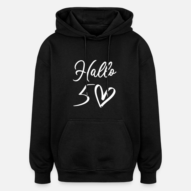 Accueil chaleureux avec design manuscrit - Sweat à capuche oversize unisexe - noir
