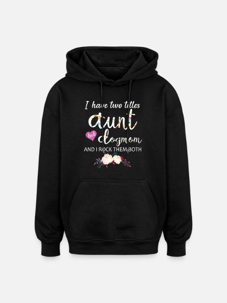 Täti ja koiraäiti, keinutan heitä molempia, kukkalahja - Unisex oversize huppari - musta