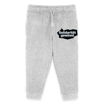 Solidarität gewinnt Spruch Statement T-Shirt - Kinder Organic Jogginghose Mini Mover von Stanley/Stella - Grau meliert - Vorne