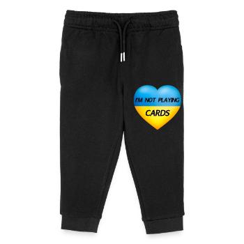 JE NE JOUE PAS AUX CARTES – CŒUR D’UKRAINE - Pantalon de jogging enfant bio Stanley/Stella - noir - Devant