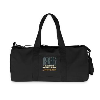 1986 40. Jubiläumsgeschenk 40 Jahre Vintage 86 - Recycelte Canvas-Sporttasche von Stanley/Stella - Schwarz - Vorne