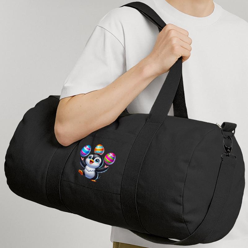Penguin juggles colorful Easter eggs Easter Recycled Canvas Sports Bag by Stanley/Stella
