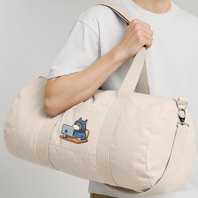 Un mignon âne hacker dort dans un sweat à capuche devant le PC Sac de sport en toile recyclée Stanley/Stella