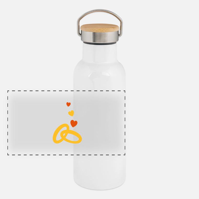 due anelli di nozze d'oro con il matrimonio il Thermos con coperchio in bambù