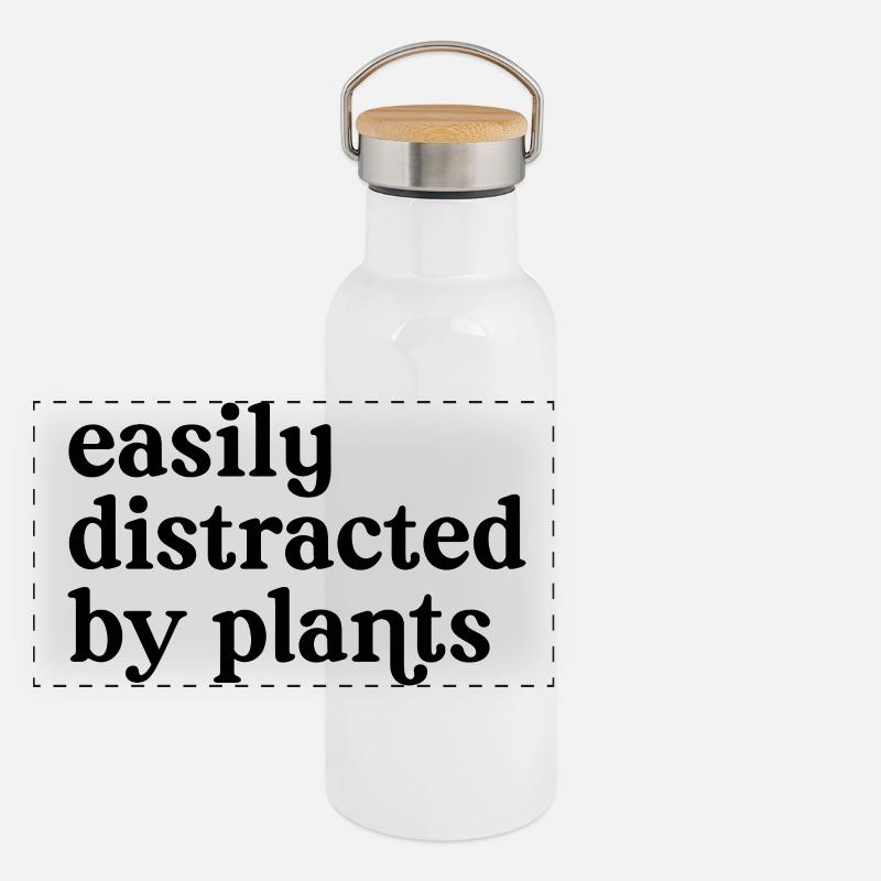 Facilement distraite par les plantes. Gourde isotherme avec bouchon en bambou