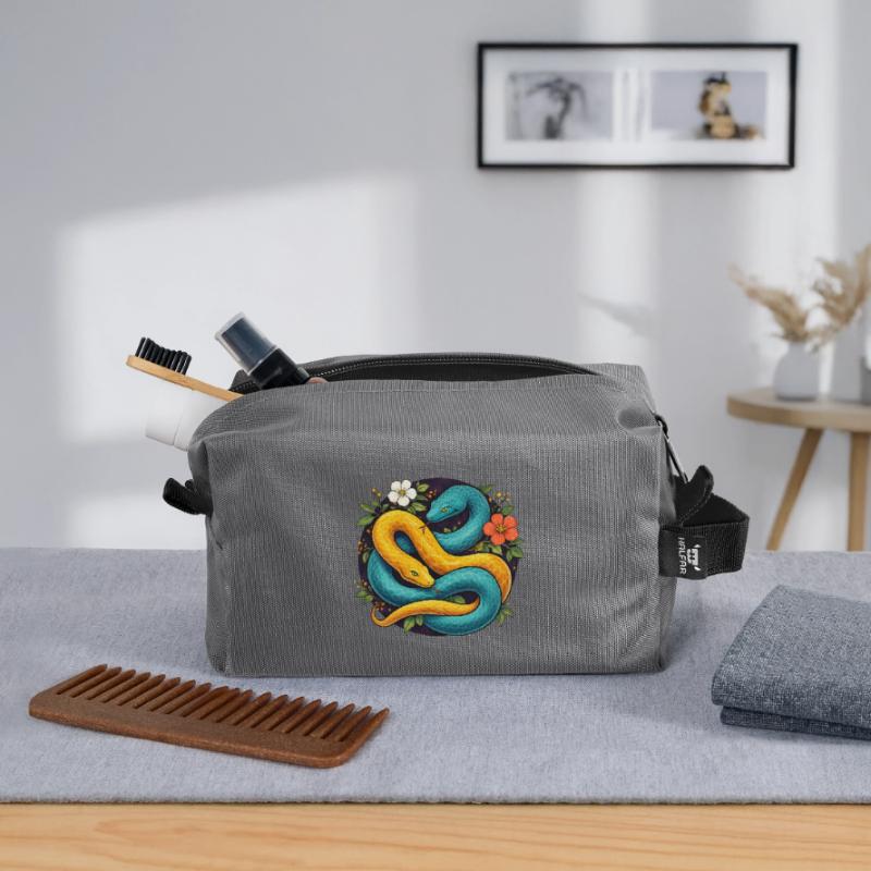 Deux serpents python dans l’anneau fleuri Trousse de toilette en tissu recyclé