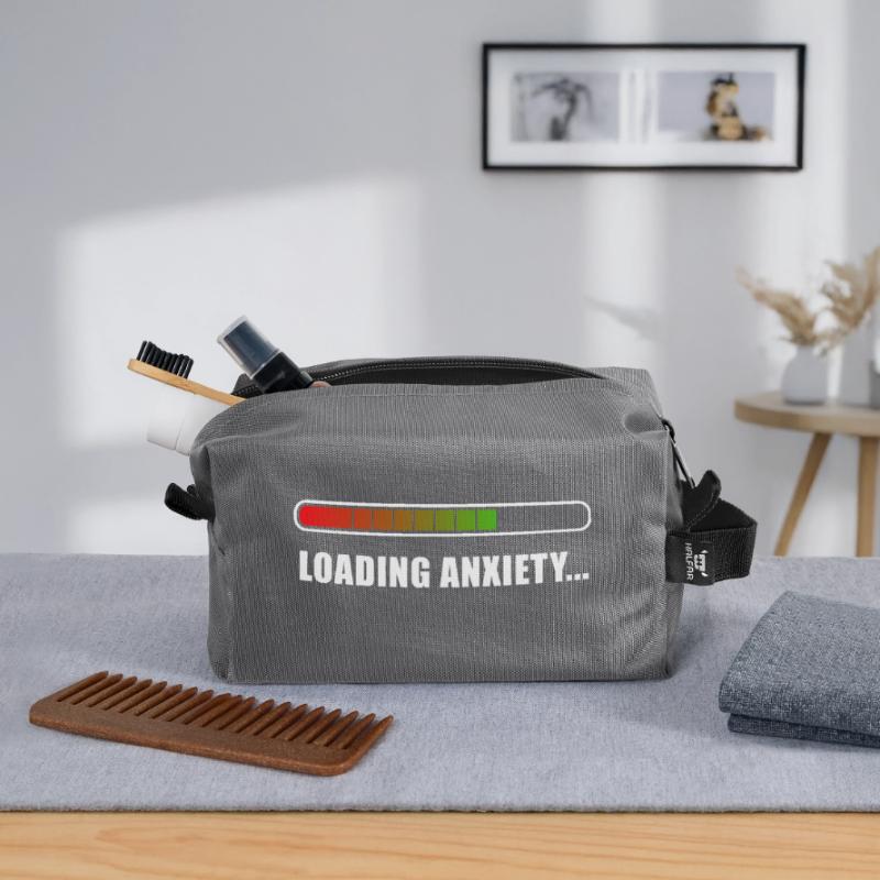 Loading L’anxiété... Trousse de toilette en tissu recyclé