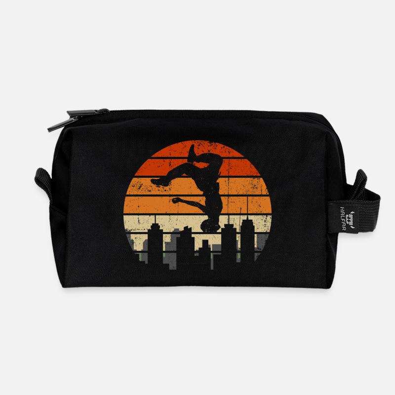 Sunset Acrobat Over City Skyline - Recycled Toiletry Zip Bag - black